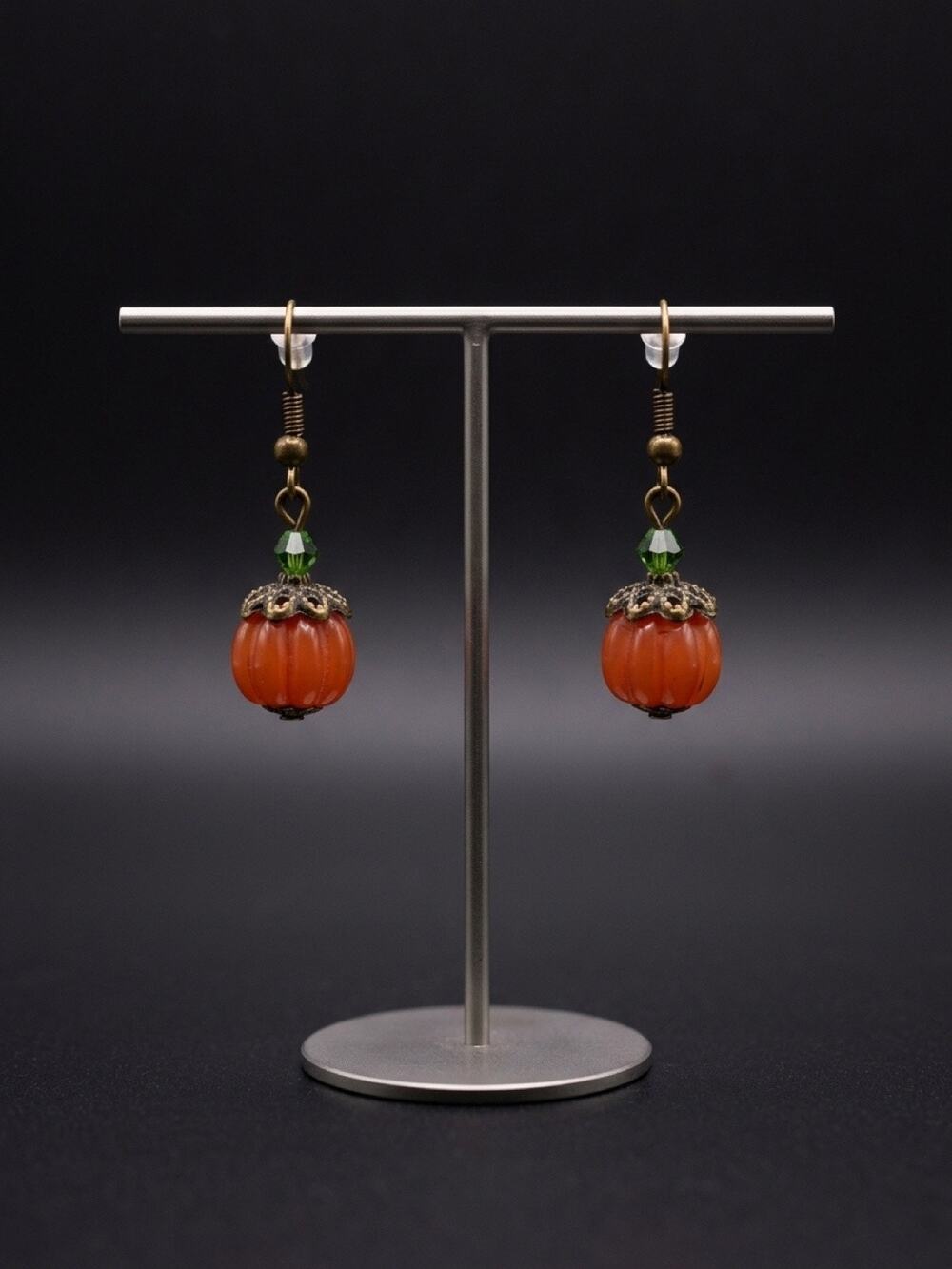 Pumpkin beaded brass tone earrings NWOT